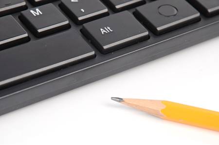 Computer keyboard and pencilの写真素材