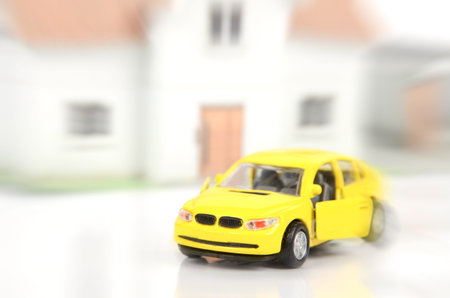 Toy car and model houseの写真素材