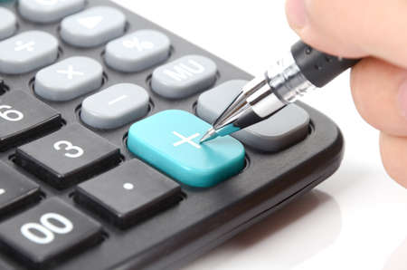 Calculator and ballpointの写真素材