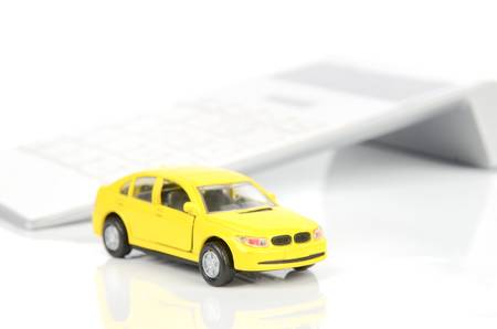 Toy car and calculatorの写真素材