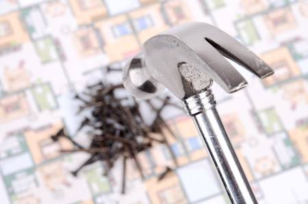 Hammer and nails on blueprintの写真素材