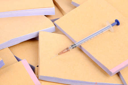 Documents and syringeの写真素材