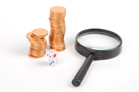 Coins,magnifier and dicesの写真素材