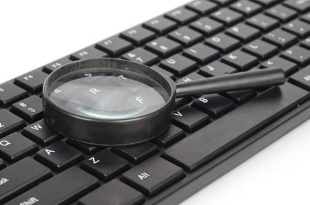 Computer keyboard and magnifierの写真素材