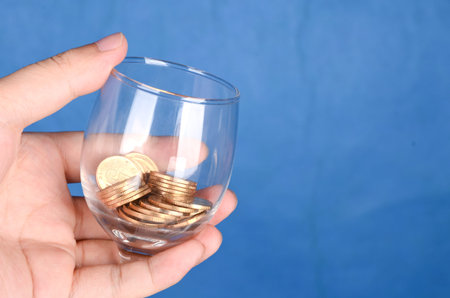 Coins and gobletの写真素材