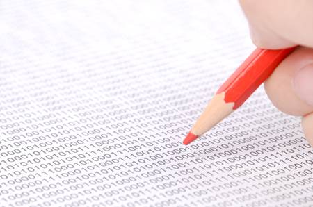 Pencil and binary codeの写真素材