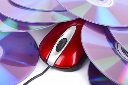 Computer mouse and DVDの写真素材