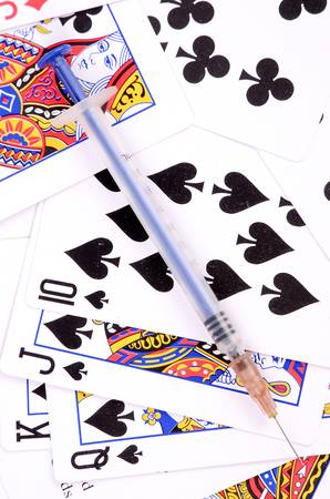 Syringe and pokerのeditorial素材