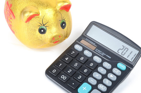 Piggy bank and calculator