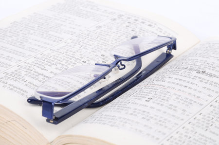 Dictionary and glasses