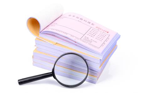 Notebook and magnifierのeditorial素材