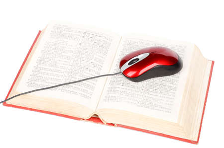 Computer mouse and dictionaryの写真素材