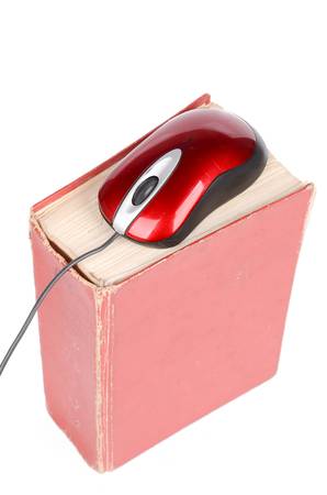 Computer mouse and dictionaryの写真素材