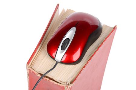 Computer mouse and dictionaryの写真素材