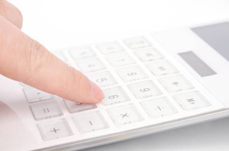 Calculator and fingerの写真素材