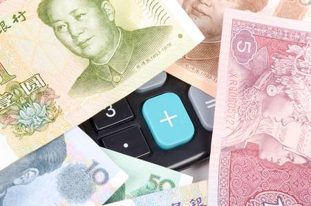 Calculator and chinese currencyの写真素材