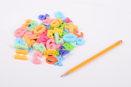 Pencil and letters