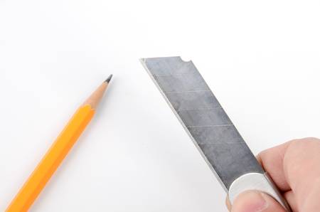 Paper knife and pencilの写真素材