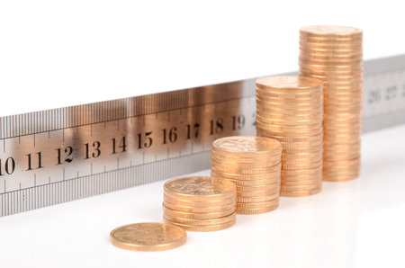 Coins and rulerの写真素材