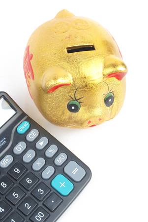 Piggy bank and calculatorの写真素材