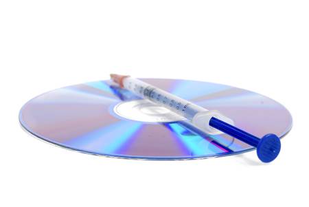DVD and syringeの写真素材