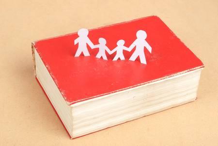 Paper man and dictionaryの写真素材