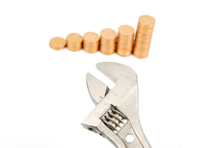 Wrench and coinsの写真素材