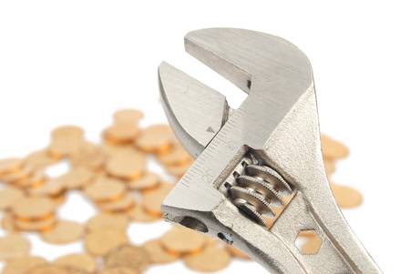 Wrench and coinsの写真素材