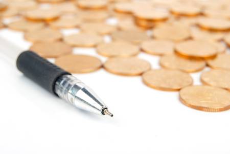 Coins and penの写真素材