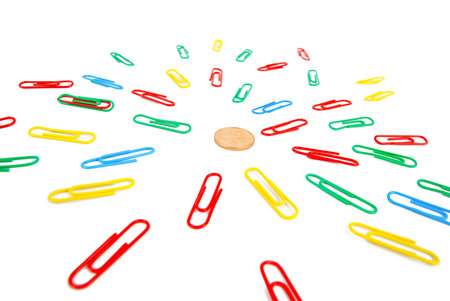 Paper clips and coin