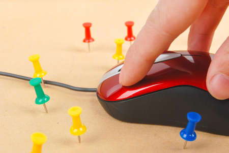 Push pin and computer mouseの写真素材