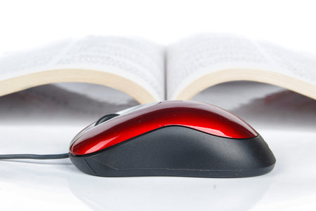 Computer mouse and book