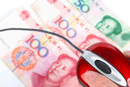 Computer mouse and currencyの写真素材