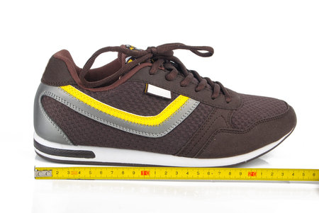 Sport shoe and rulerの写真素材