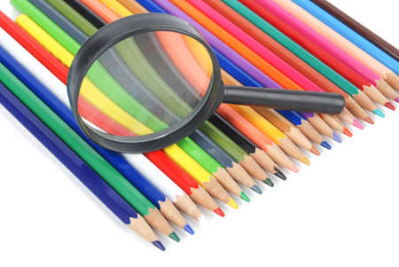 Color pencil and magnifying glassの写真素材
