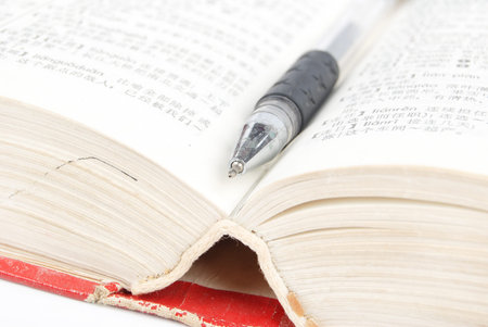 Pen and dictionaryの写真素材