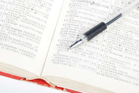 Pen and dictionaryの写真素材