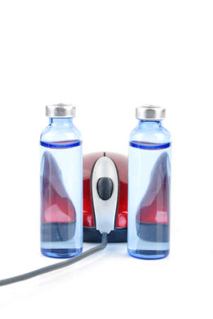 Computer mouse and medicineの写真素材