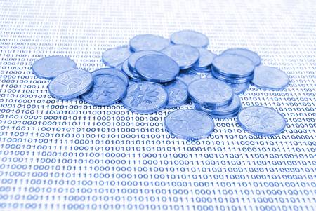 Coins on binary codeの写真素材