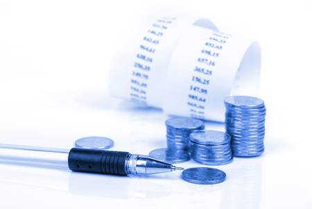 Coins and shopping billの写真素材
