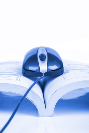 Computer mouse and book