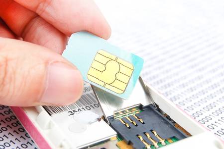 Sim card with cellphoneの写真素材