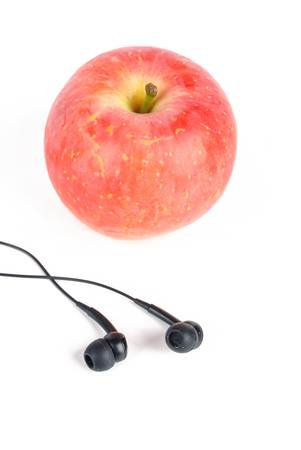 Apple with earphoneの写真素材