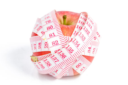 Apple and measuring tape