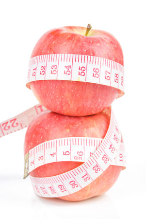 Apple and measuring tape