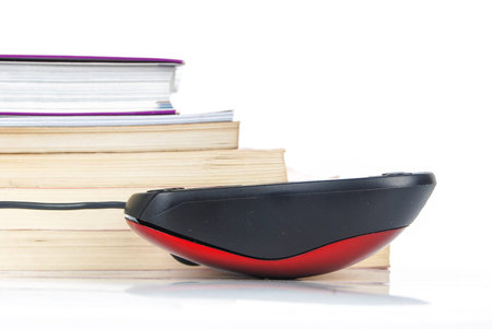 Mouse and books on white backgroundの写真素材