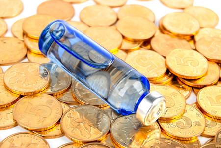 Medicine and coin on white backgroundの写真素材