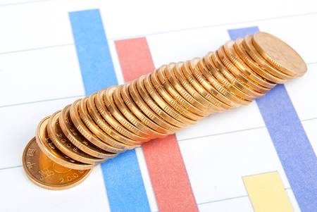 Coins on financial graphの写真素材