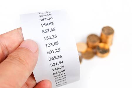 Coins and receiptの写真素材
