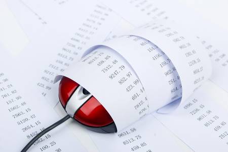 Computer mouse with financial dataの写真素材